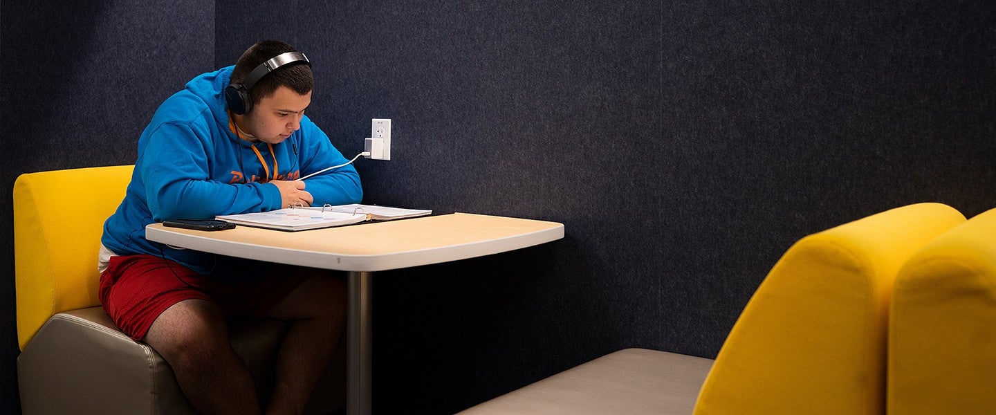 a student studies in the Allen Hall Experience Hub