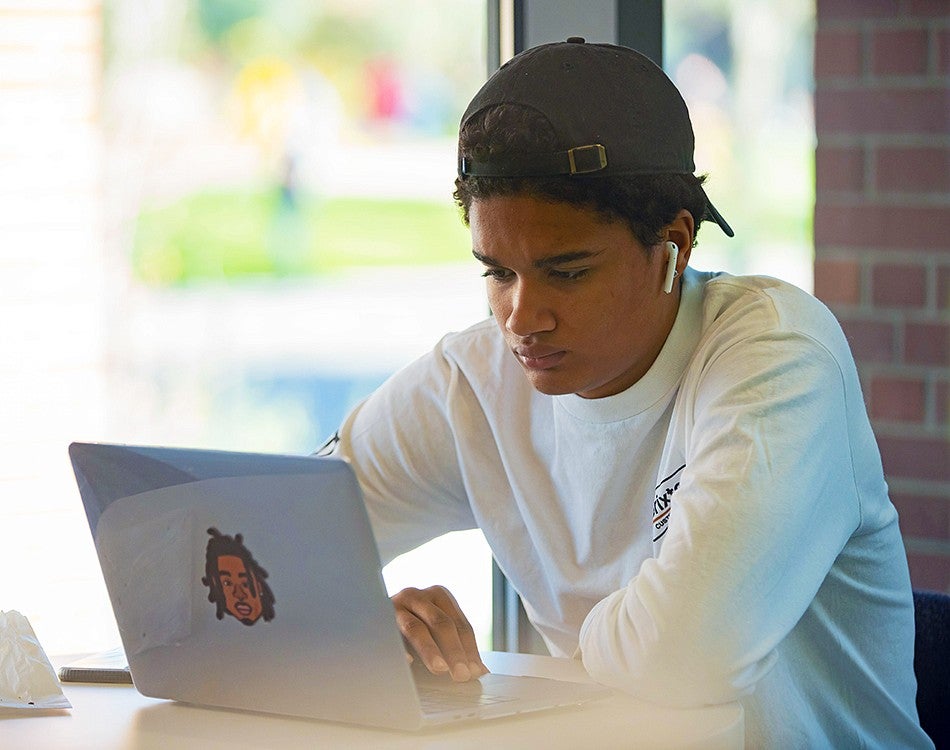 student using a laptop