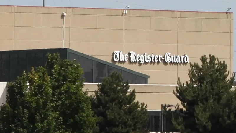 picture of the outside of The Register-Guard building and its sign
