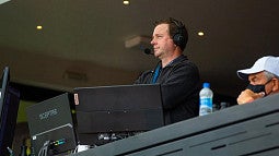 Paul Swangard in the broadcast booth at Hayward Field