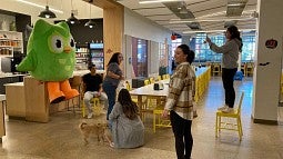 Zaria Parvez and colleagues set up to film with the Duolingo owl mascot